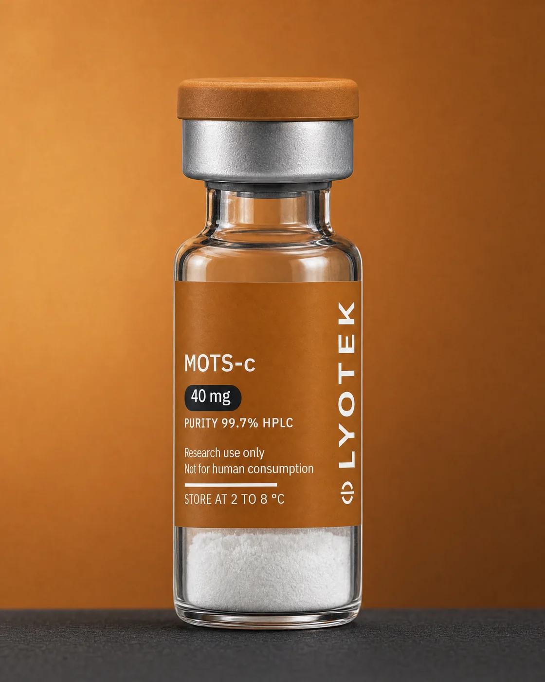 MOTS-c 40 mg in its 2R vial, standing on a black plinth against a copper ground