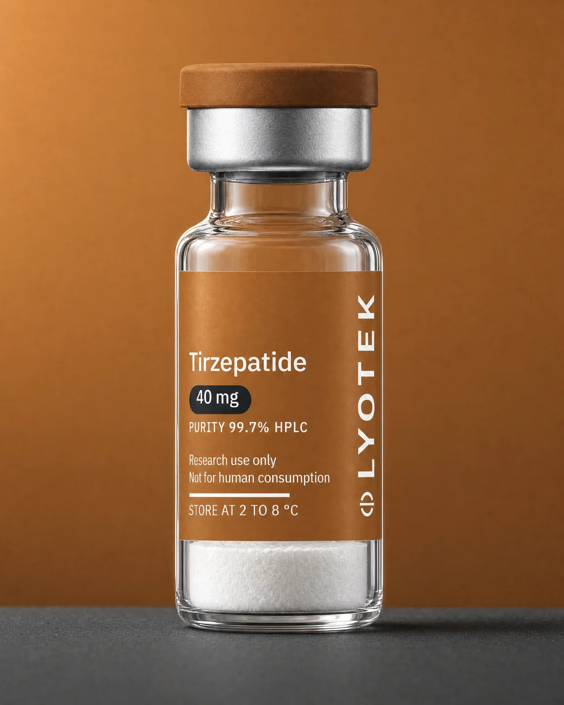 Tirzepatide 40 mg in its 2R vial, standing on a black plinth against a copper ground