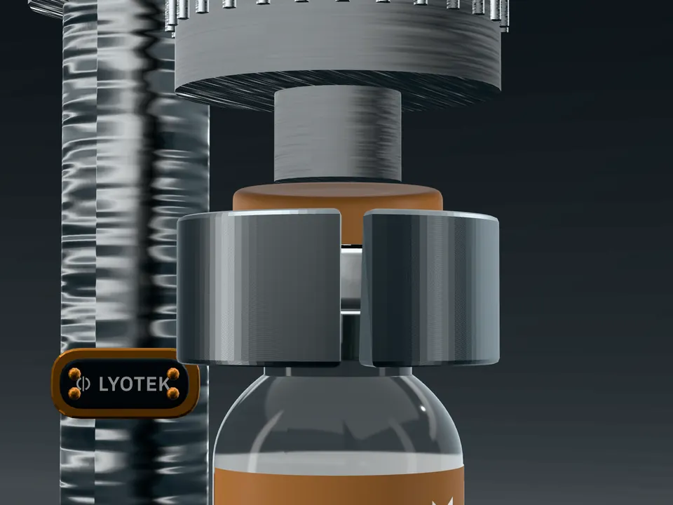 Crimping head with the collet jaws closed on the aluminium skirt under the neck flange of a vial.